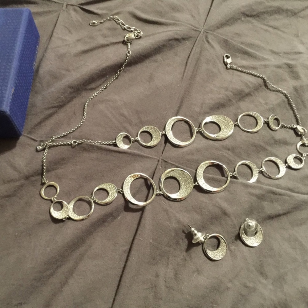 Swarovski crystals in silver tone setting set - earrings, bracelet, & necklace.